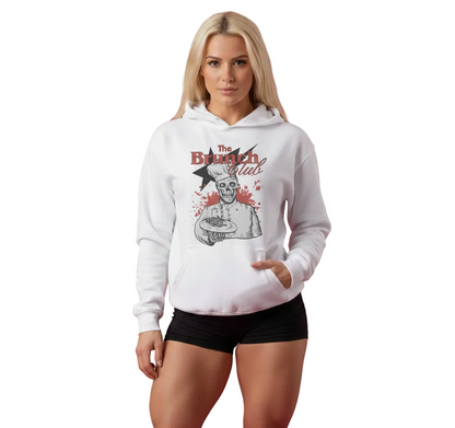 Woman wearing a white hoodie with 'The Brunch Club' design on a pink background